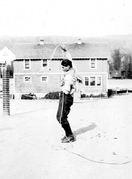 Young man with lasso, Williams Lake, 1925